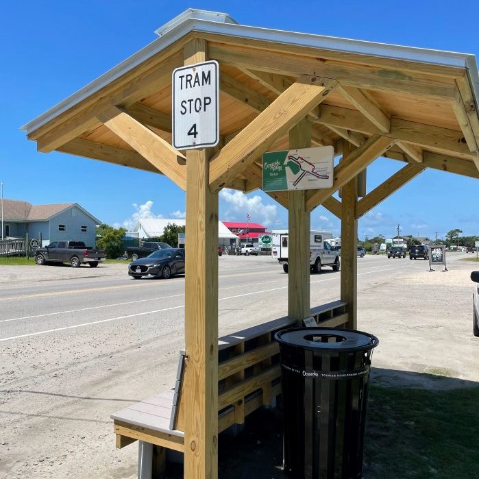 Covered shelters, trash cans enhance tram stops in Ocracoke.
