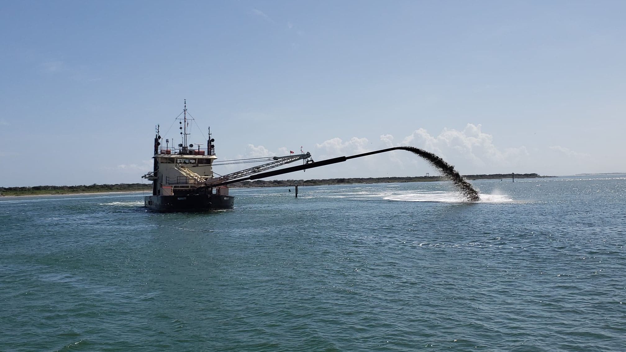 Dredging of channels across Hatteras Inlet to continue through end of month