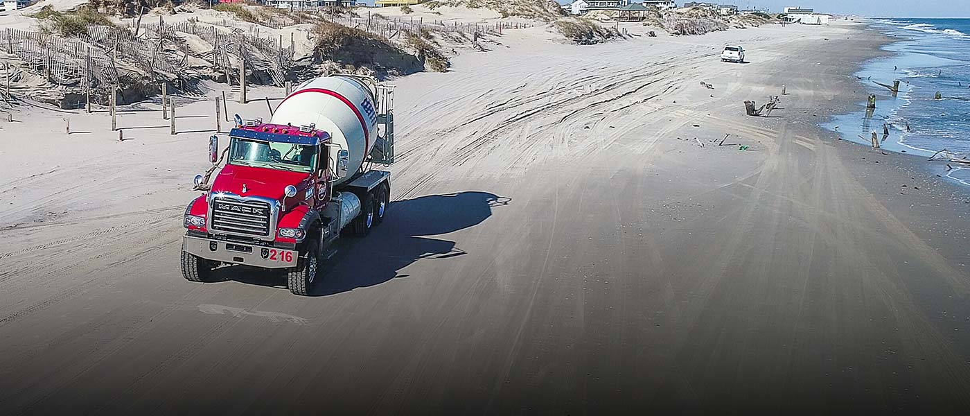 CRMP Inc.’s new trucks used to haul concrete to Carova featured in Bulldog Magazine