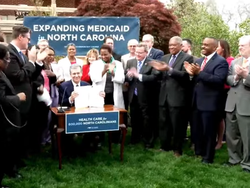 VIDEO: Gov. Roy Cooper signs Medicaid expansion bill into law